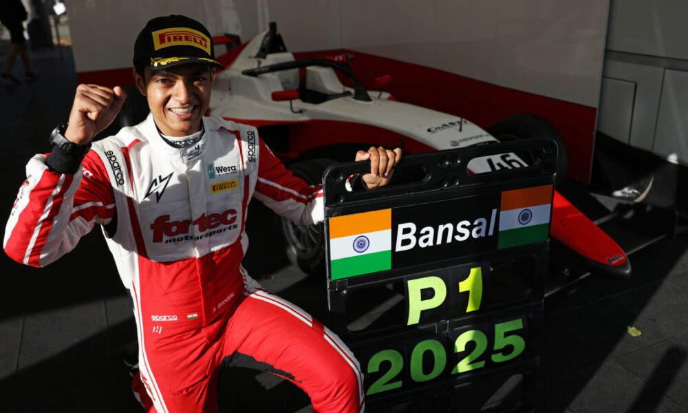 Ary Bansal posing with P1 board after his win.
