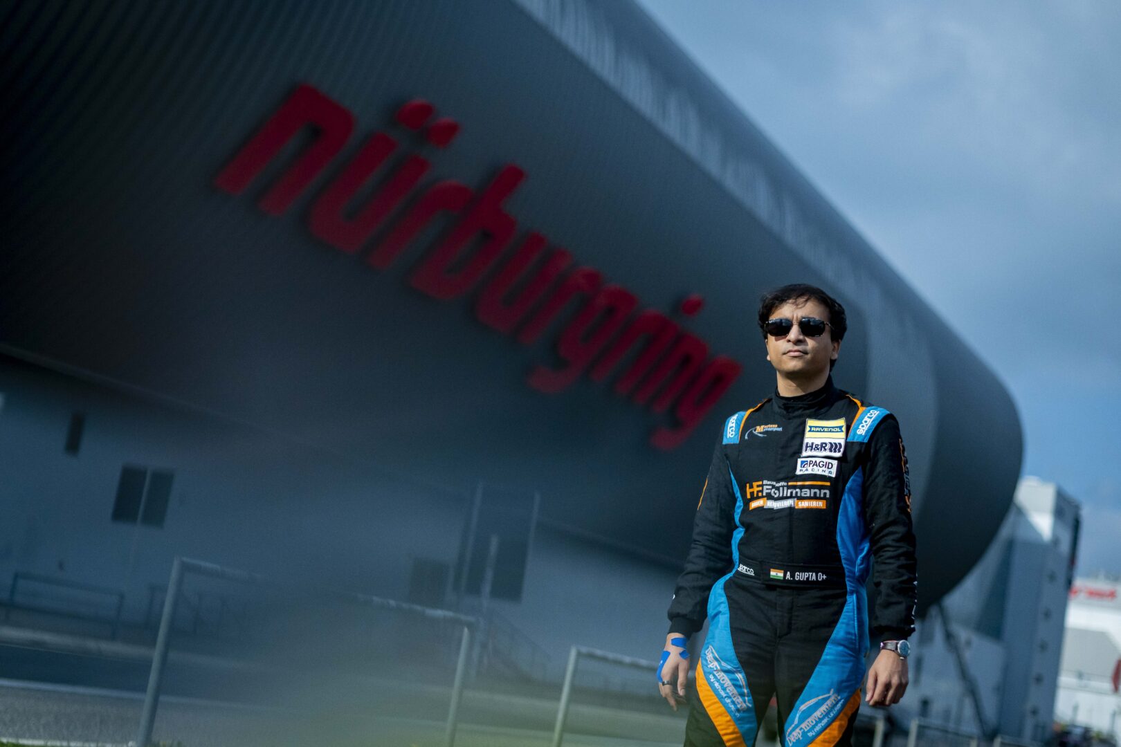Akshay Gupta stands at Nurburgring