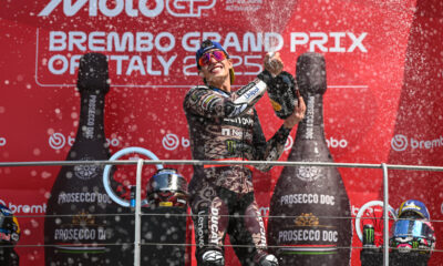 Marc Marquez celebrates on the podium after winning the MotoGP Grand Prix of Mugello