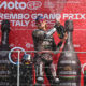 Marc Marquez celebrates on the podium after winning the MotoGP Grand Prix of Mugello