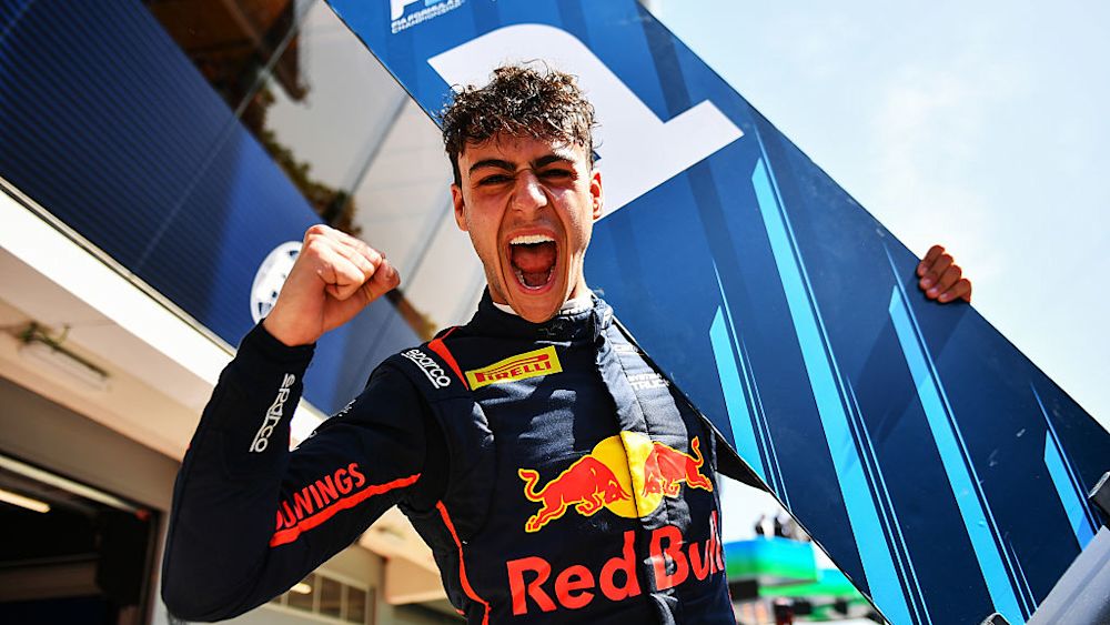 Arvid Lindblad celebrates after taking the feature race win in Round 6 of Formula 2 in Barcelona.