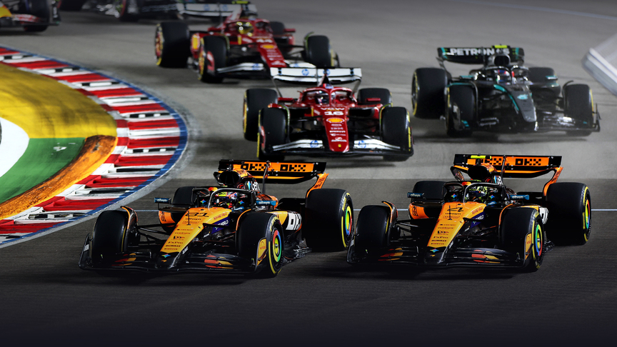 The McLaren's battle it out in the Singapore GP.